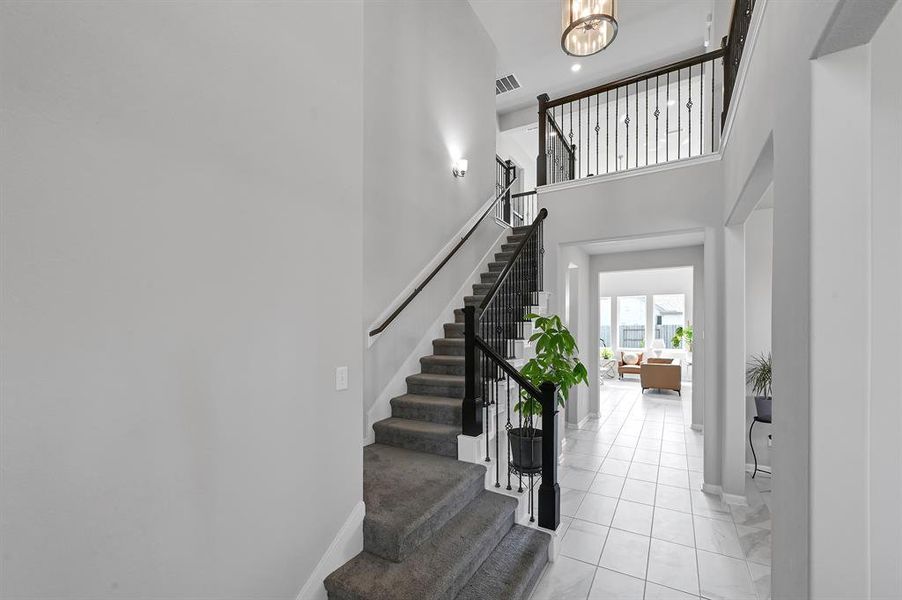 Welcoming two-story entry.