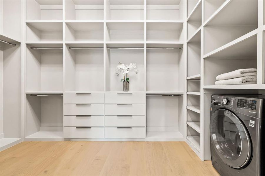 Laundry, built in drawers, ample shelves and hanging.  Just add a martini and a lounge chair.