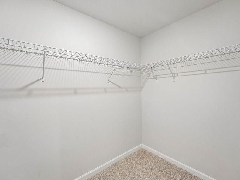 Spacious, unfurnished interior of a new home in Hemingway - Highland Series, Cumming (Image 21).