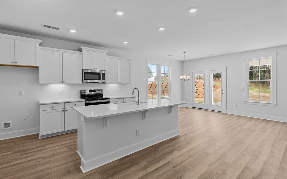 Furnished interior view inside a new home in Fieldstone, Lexington (Image 10).