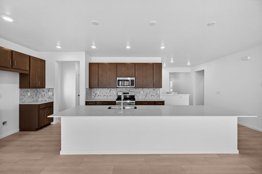 Furnished interior view inside a new home in Trailstone, Arvada (Image 8).