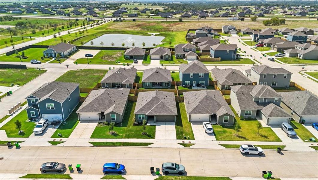 Aerial view of residential area with a large body of water