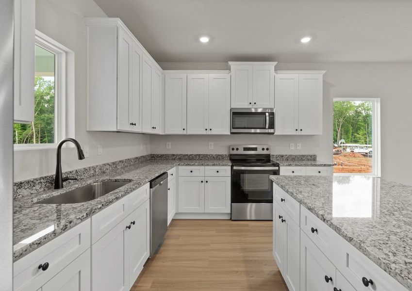 The kitchen has granite countertops