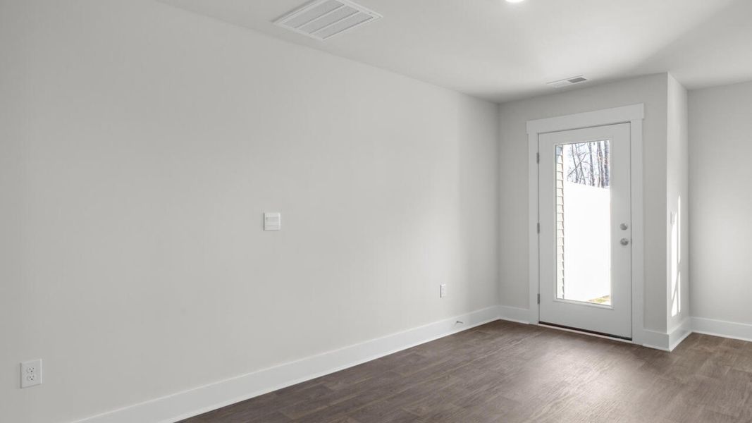 Spacious, unfurnished interior of a new home in Townes at Seabrooke, Leland (Image 14).