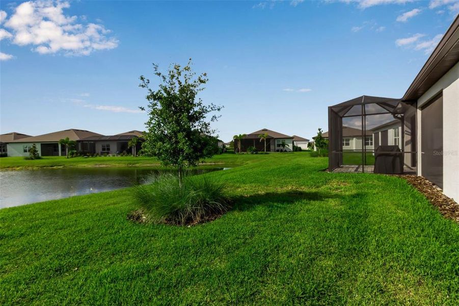 Front exterior of a new home in Del Webb BayView, Parrish, FL, highlighting curb appeal (Image 22). Front exterior of a new home in Del Webb BayView, Parrish, FL, highlighting curb appeal (Image 22).