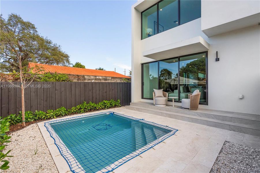 Exterior details and patio area of a home in , Miami (Image 32). Exterior details and patio area of a home in , Miami (Image 32).