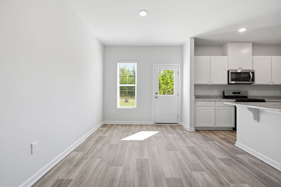 Spacious, unfurnished interior of a new home in Carpenter Falls, Durham (Image 15).