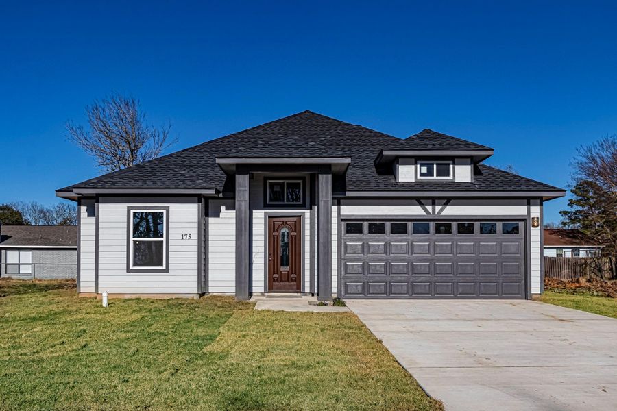 Front exterior of a new home in , Livingston, TX, highlighting curb appeal (Image 23). Front exterior of a new home in , Livingston, TX, highlighting curb appeal (Image 23).