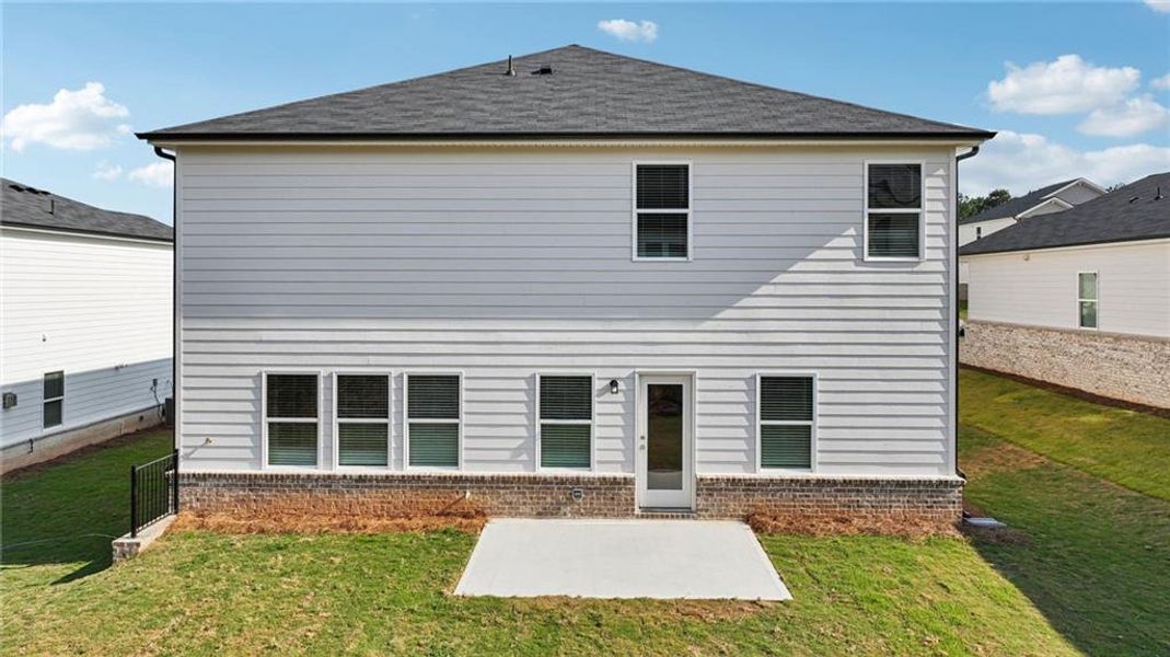 Exterior details and patio area of a home in Parkside at Grayson, Grayson (Image 2).