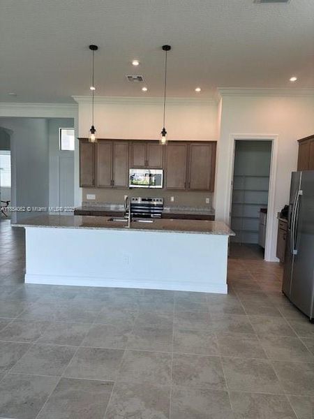 Furnished interior view inside a new home in , Port St. Lucie (Image 9).