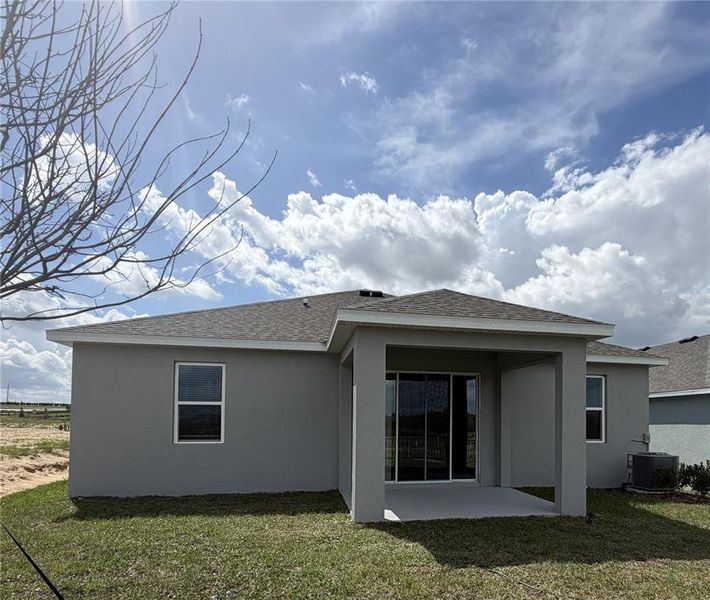 Exterior details and patio area of a home in Hodges Reserve, Howey-in-the-Hills (Image 3).