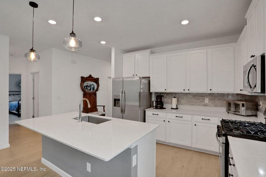 Furnished interior view inside a new home in Tributary: Lakeview at Tributary 50's, Yulee (Image 15).