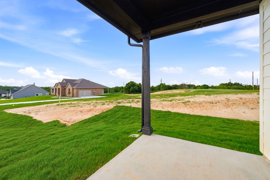 Exterior details and patio area of a home in Saddleback Estates, Boyd (Image 3).