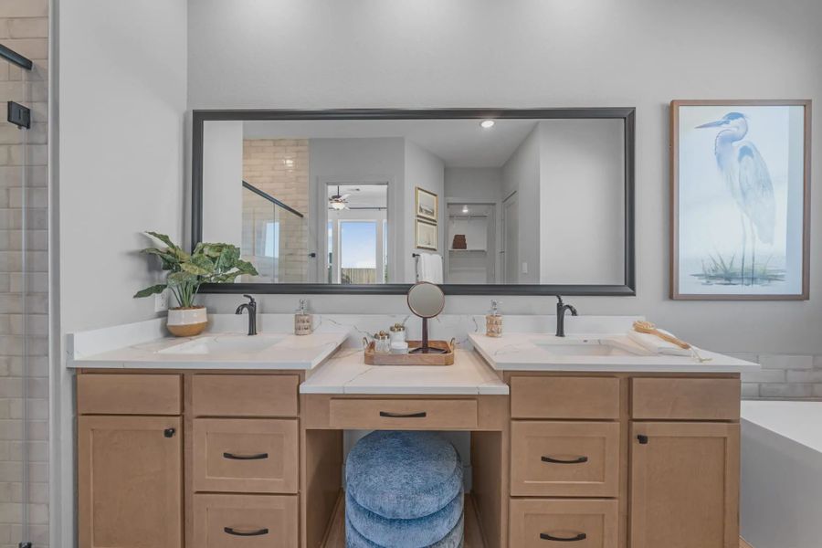 Representative furnished interior of a home built from the Hampton by Chesmar Homes in Meridiana 50's and 60's, Manvel (Image 52).