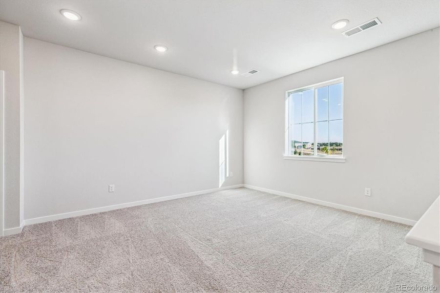 Spacious, unfurnished interior of a new home in Floret Collection at Alder Creek, Parker (Image 21).