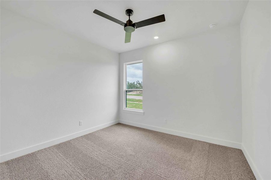 Empty room featuring baseboards, light carpet, a ceiling fan, and recessed lighting Empty room featuring baseboards, light carpet, a ceiling fan, and recessed lighting