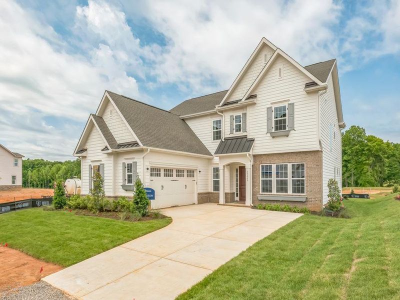 Representative exterior photo of a completed home built from the Garrison by JPOrleans in Coventry Glen, Huntersville, NC (Image 12).