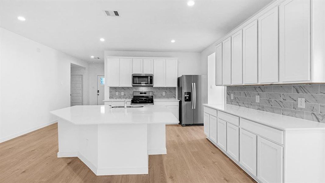 Furnished interior view inside a new home in Tamarron, Fulshear (Image 9).