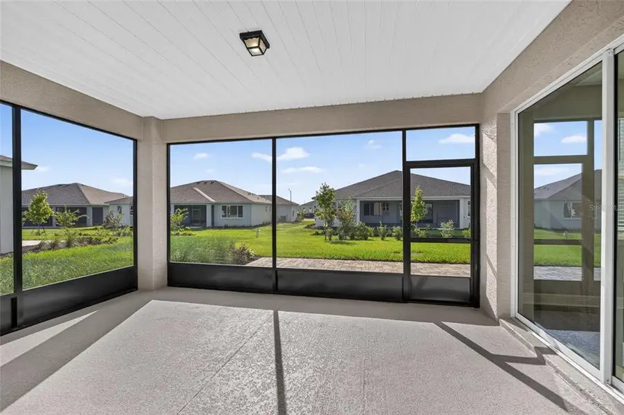 Exterior details and patio area of a home in , Ocala (Image 4).