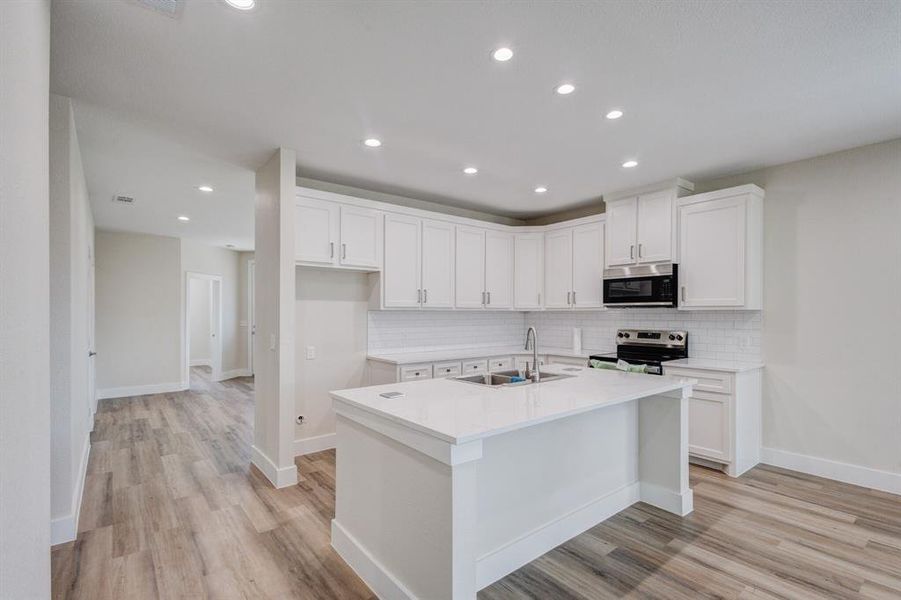 Furnished interior view inside a new home in , Grand Prairie (Image 8). Furnished interior view inside a new home in , Grand Prairie (Image 8).