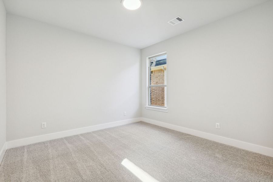 Representative unfurnished interior of a home built from the Cardinal by Centre Living Homes in Dove Hollow, Waxahachie (Image 25).