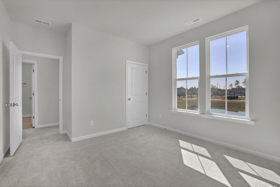 Spacious, unfurnished interior of a new home in Grand Park, Leland (Image 22).