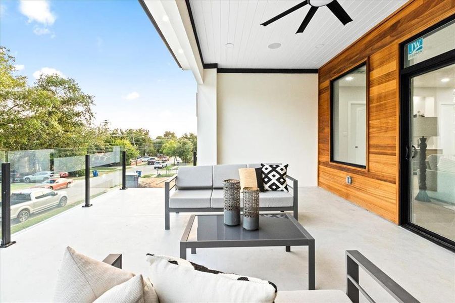 Balcony featuring ceiling fan and an outdoor hangout area