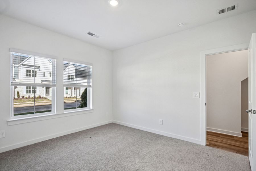 Spacious, unfurnished interior of a new home in Greystone - Highland Townhomes, Smyrna (Image 15).
