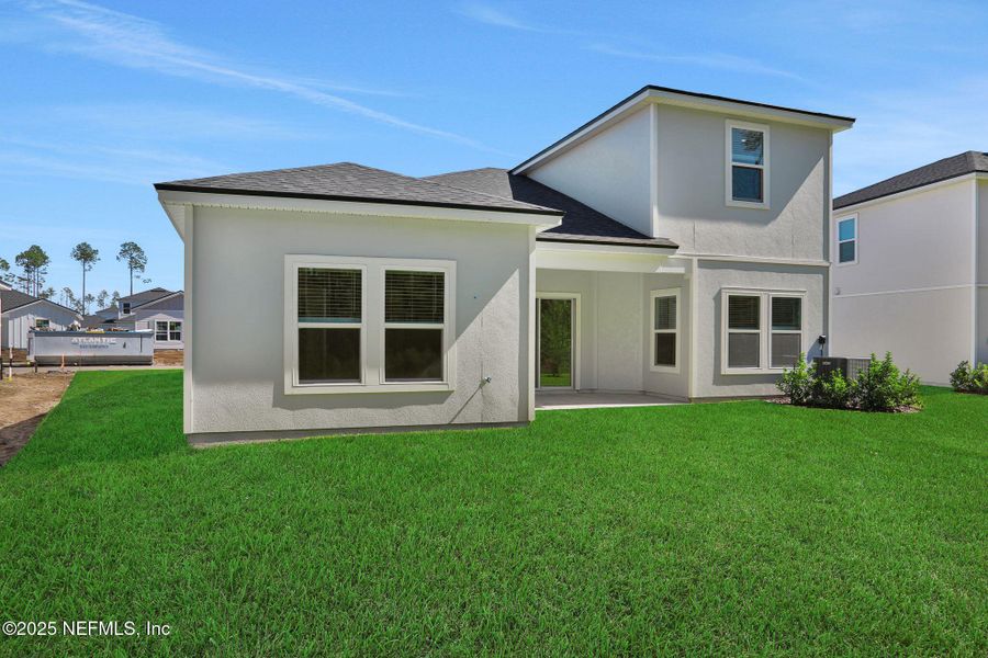 Exterior details and patio area of a home in Cordova Palms, St. Augustine (Image 3).
