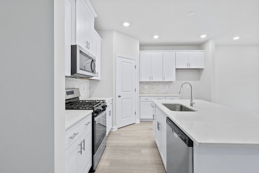 Furnished interior view inside a new home in Waterside - Coastline Series, Longs (Image 3). Furnished interior view inside a new home in Waterside - Coastline Series, Longs (Image 3).