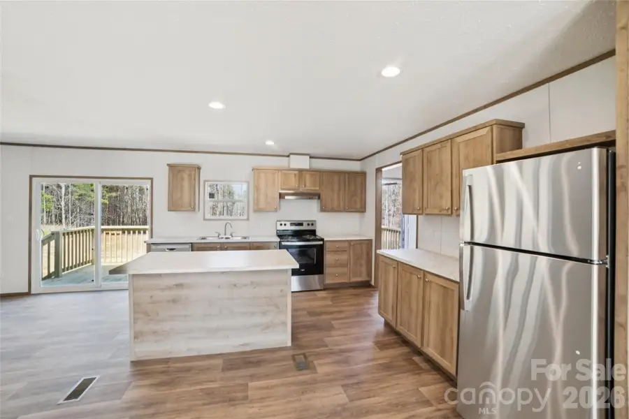 Furnished interior view inside a new home in , Vale (Image 3).