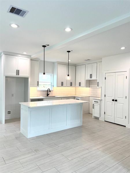 Up to the ceiling cabinetry