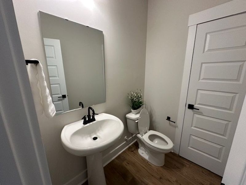 This thoughtfully designed bathroom offers a comfo