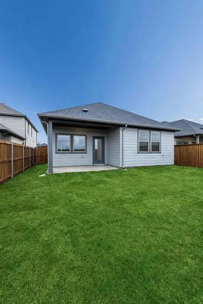 Covered Patio in the Cedar home plan by Trophy Signature Homes – REPRESENTATIVE PHOTO