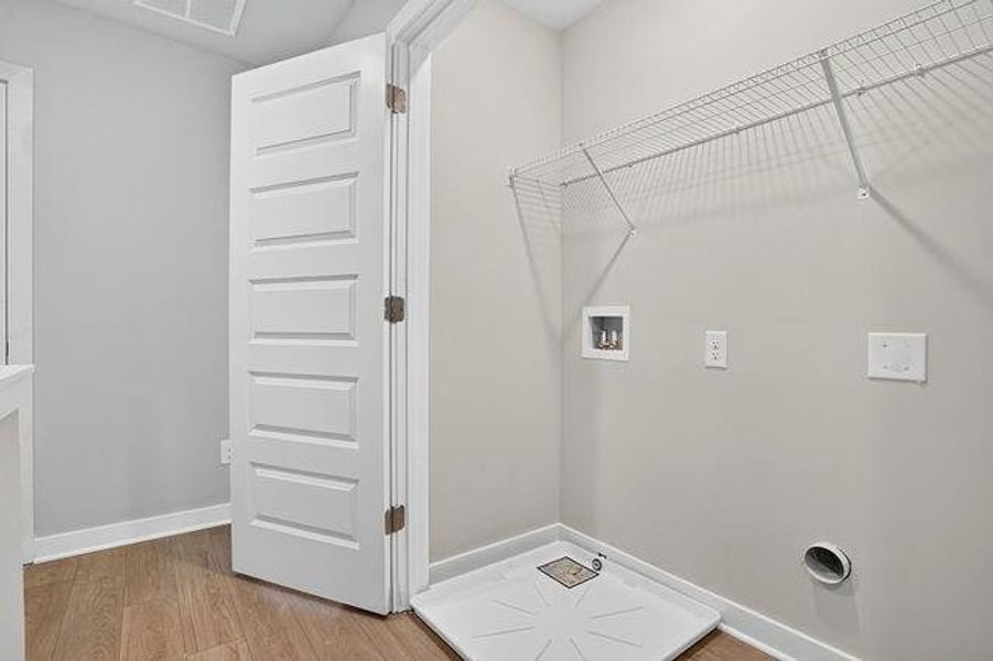 Spacious, unfurnished interior of a new home in The Cottages at East Lanier, Fayetteville (Image 10).