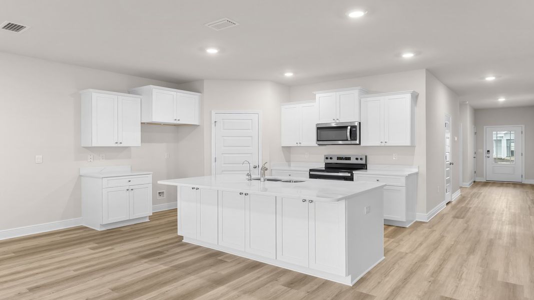 Representative furnished interior of a home built from the The Rhett by D.R. Horton in Hodges Bayou Plantation, Panama City (Image 7).
