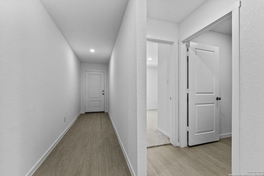 Spacious, unfurnished interior of a new home in Torian Village: Watermill Collection, San Antonio (Image 13).