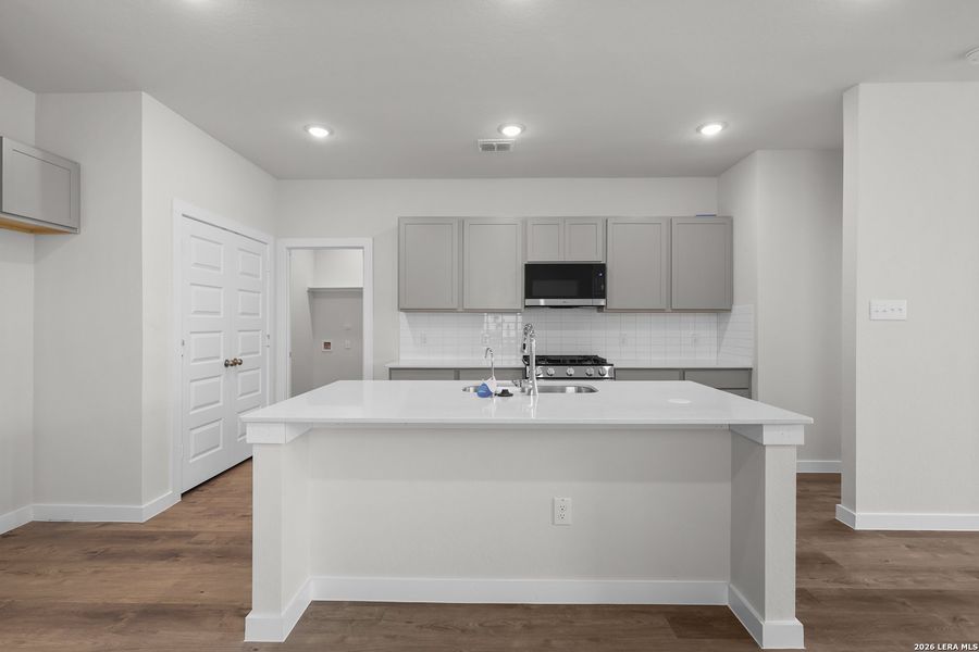 Furnished interior view inside a new home in Hacienda, San Antonio (Image 10).