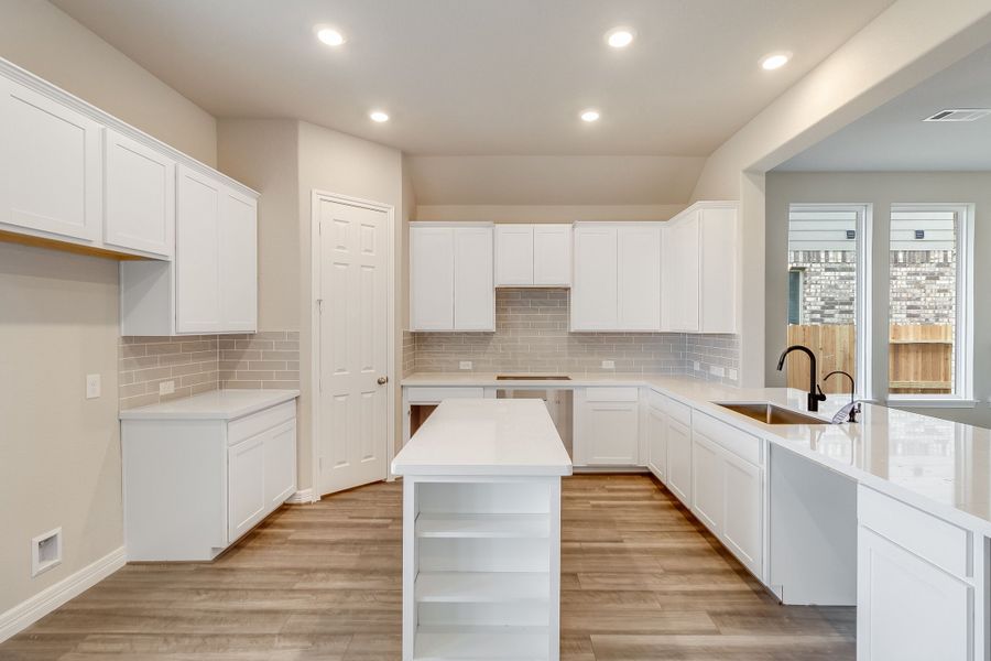 Kitchen. Note: Sample product photo - actual exterior and interior selections may vary by homesite