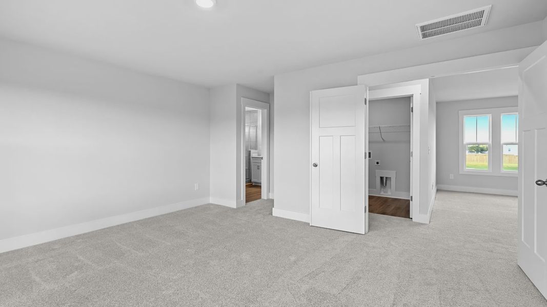 2 story single family home, all white, owner's suite