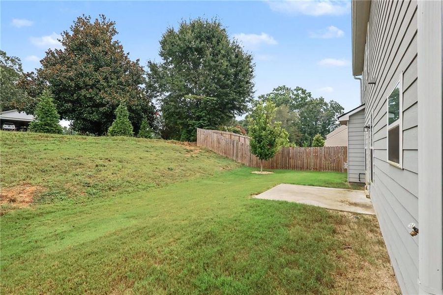 Exterior details and patio area of a home in Old Lost Mountain Estates, Powder Springs (Image 22).
