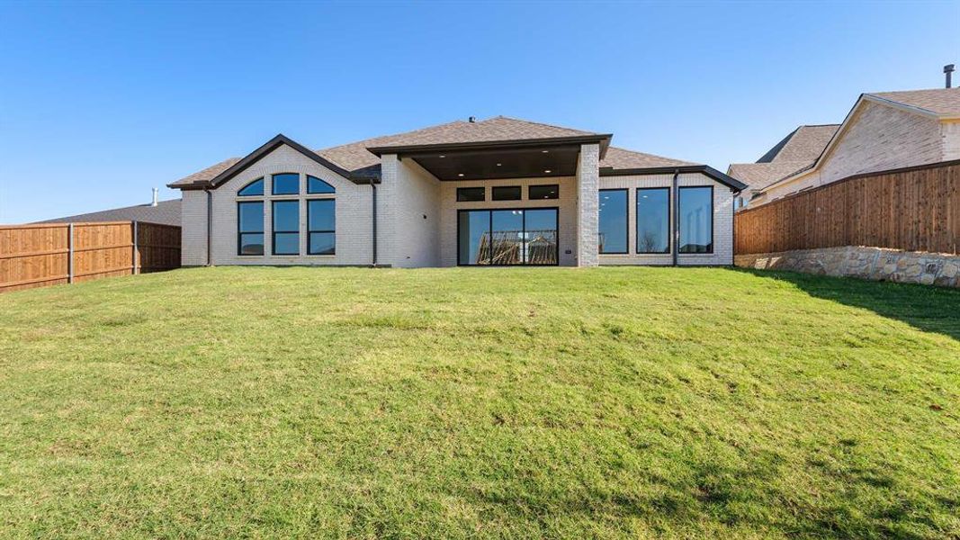 Exterior details and patio area of a home in Talon Hills 60'/70', Fort Worth (Image 3).