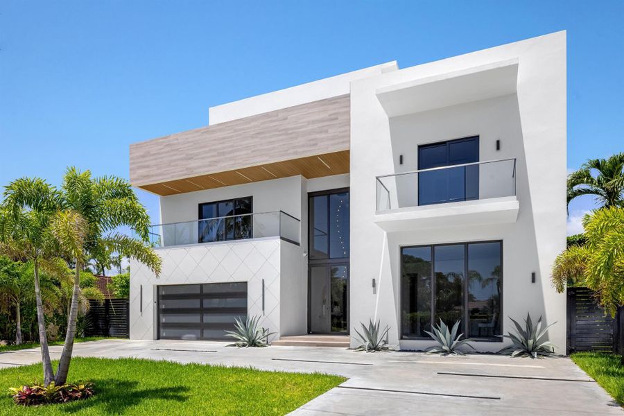 Front exterior of a new home in , Boca Raton, FL, highlighting curb appeal (Image 27). Front exterior of a new home in , Boca Raton, FL, highlighting curb appeal (Image 27).