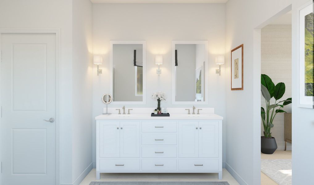 Primary bath with freestanding vanity and white framed mirrors