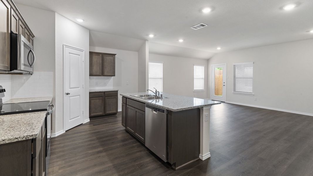 Representative furnished interior of a home built from the X40L Lakeway by D.R. Horton in Valor Farms, Royse City (Image 13).