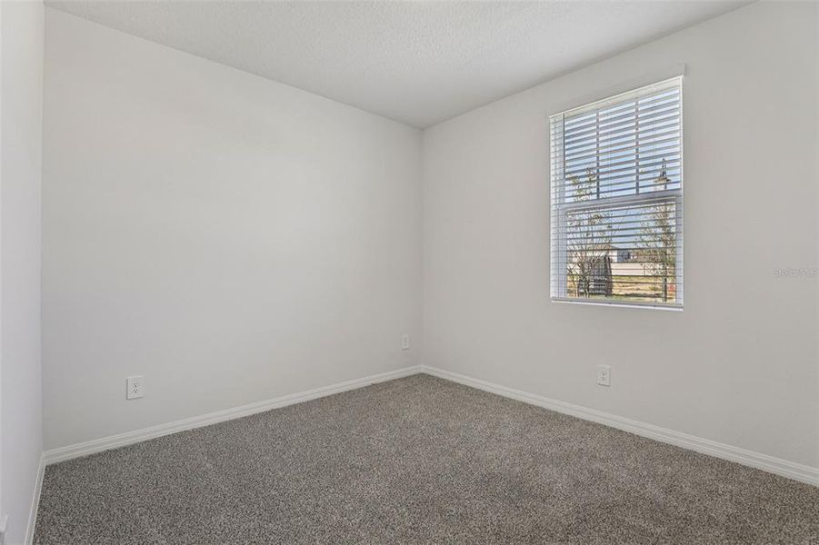 Spacious, unfurnished interior of a new home in Crosswinds - Signature Series, Haines City (Image 17).