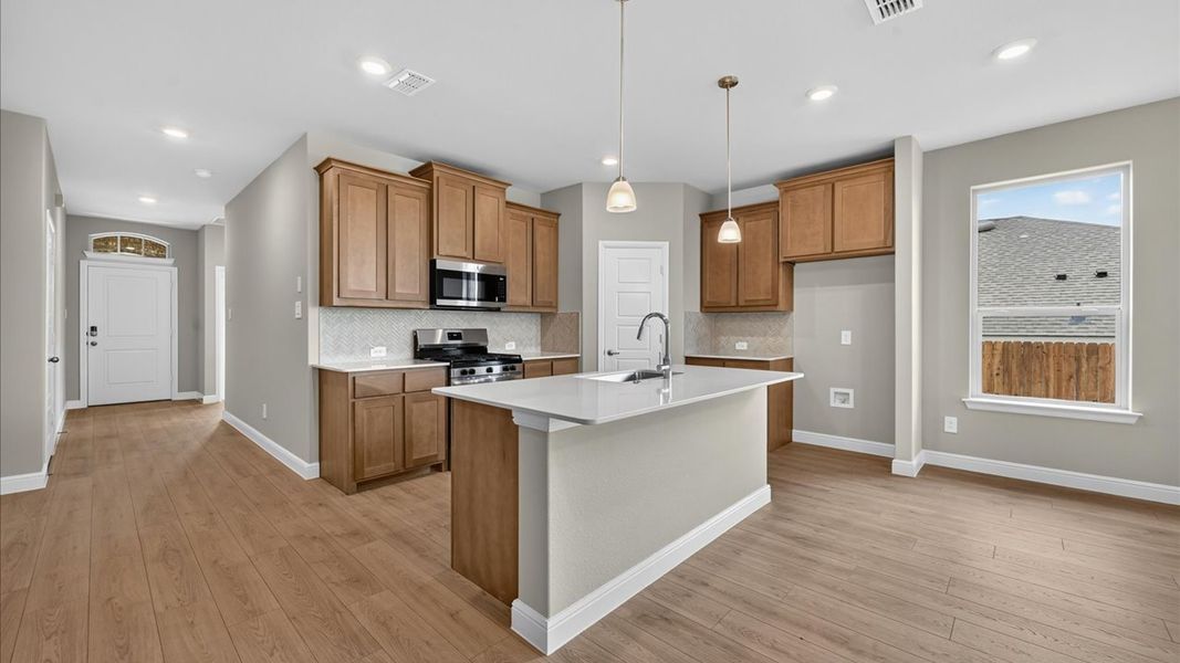 Furnished interior view inside a new home in Bluestem, Rhome (Image 6).