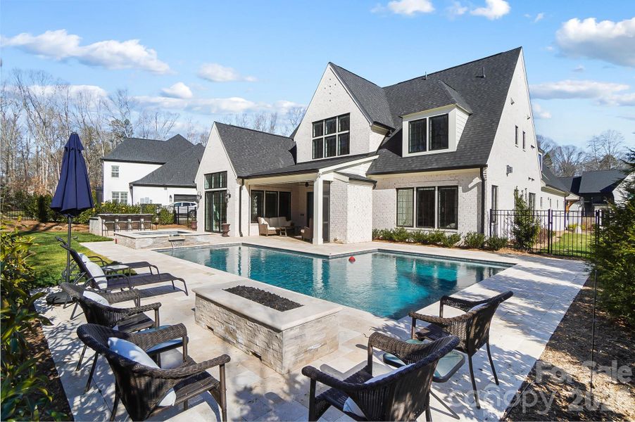 Exterior details and patio area of a home in , Weddington (Image 21).