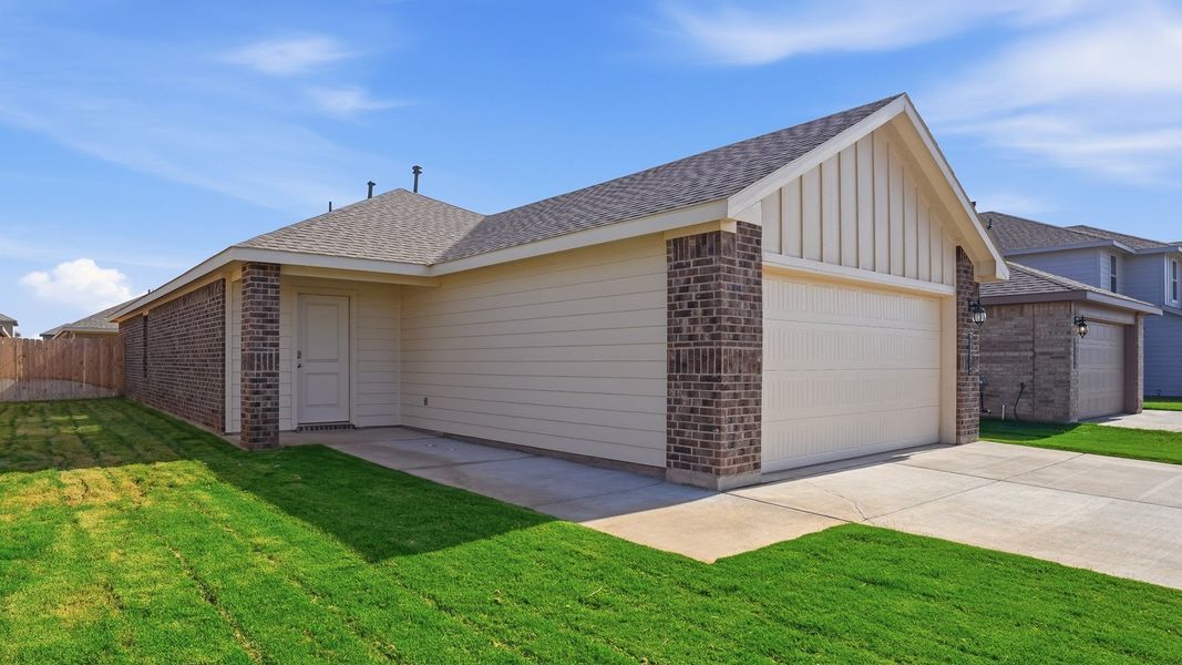 Front exterior of a new home in Terra Vista, Lubbock, TX, highlighting curb appeal (Image 2). Front exterior of a new home in Terra Vista, Lubbock, TX, highlighting curb appeal (Image 2).