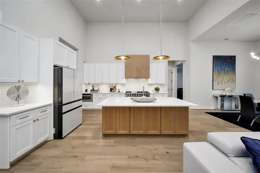 Furnished interior view inside a new home in ARTAVIA, Conroe (Image 31).